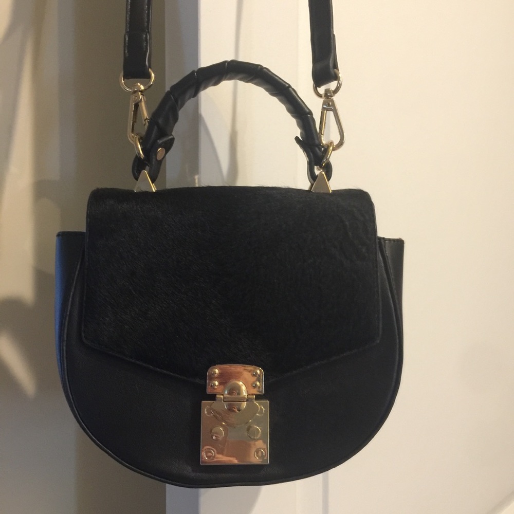 Sandra Roberts black Crossbody with red interior